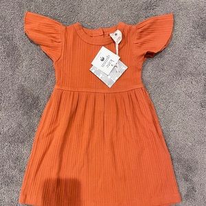Kate quinn orange dress